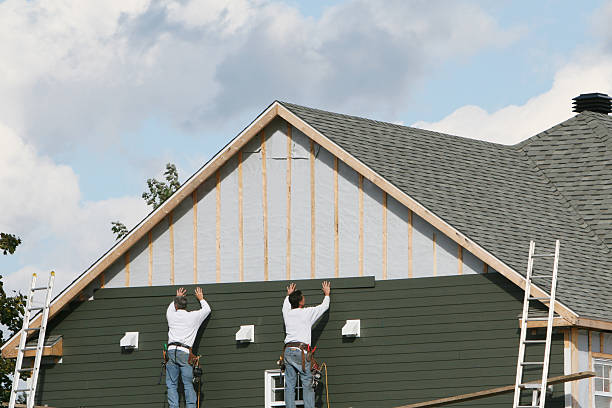 Professional Siding technician working in Boomer, NC